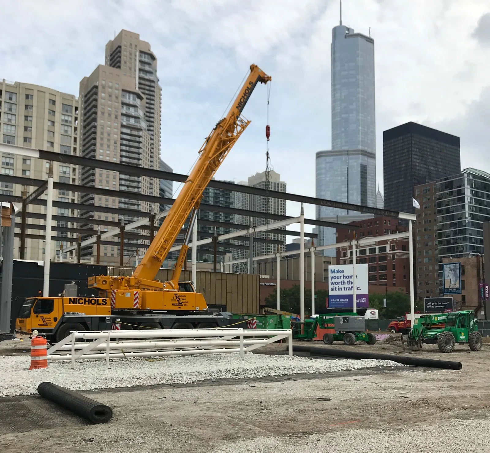 Geogrid rolls and crane on a downtown Chicago building site